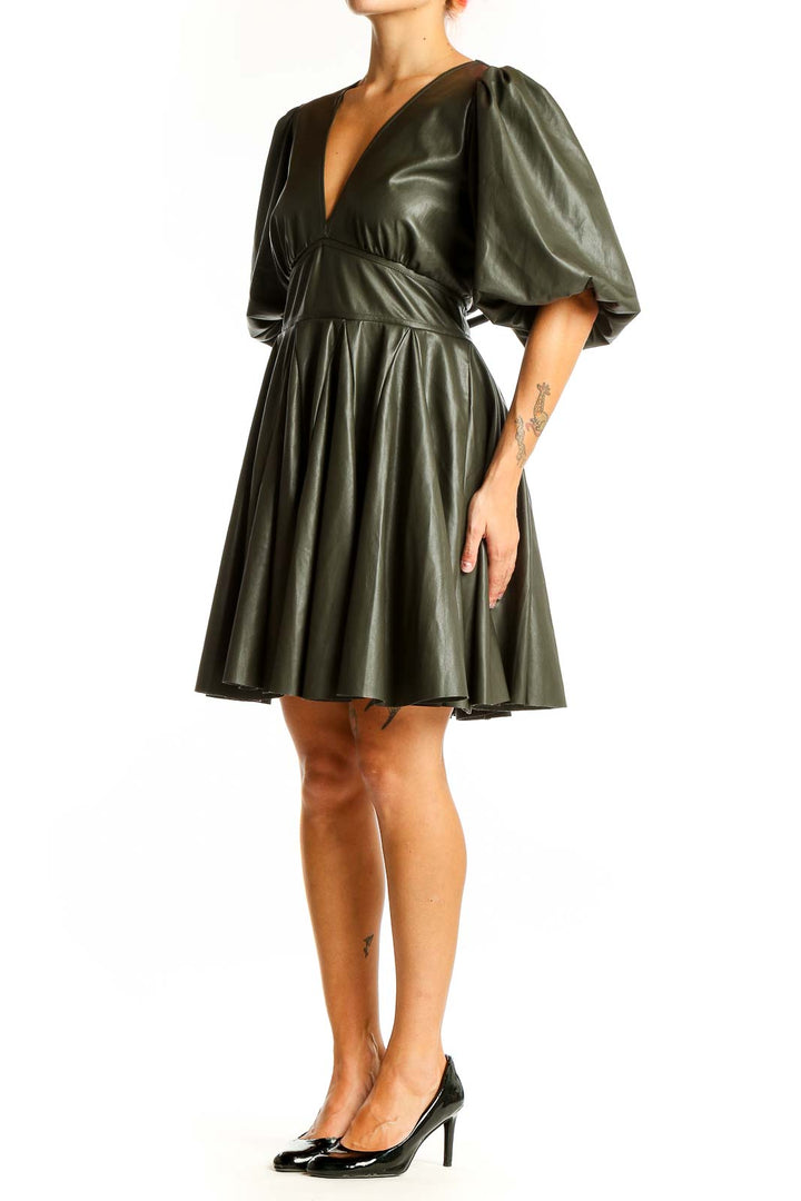 Front view of olive faux leather puff sleeve dress from Express