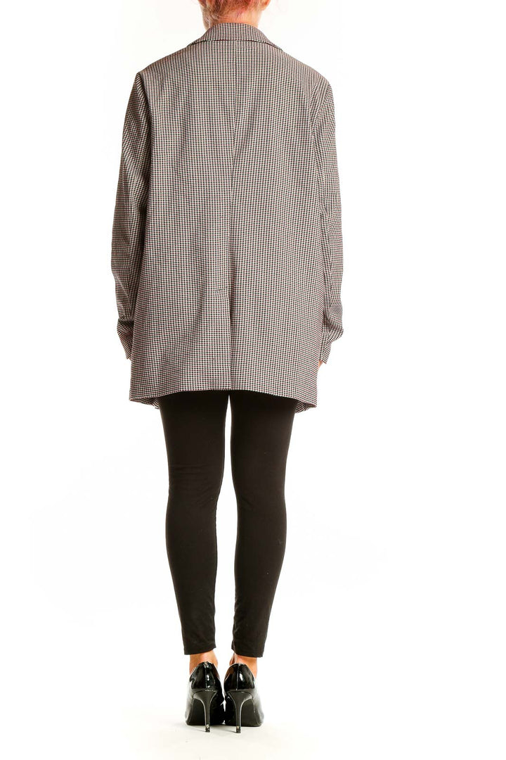 Side view of Adrianna Papell brown houndstooth check oversized blazer on model