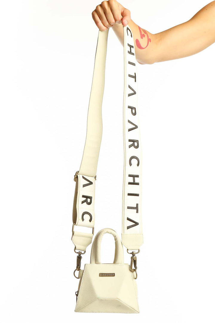PARCHITA cream mini crossbody bag with logo strap front view