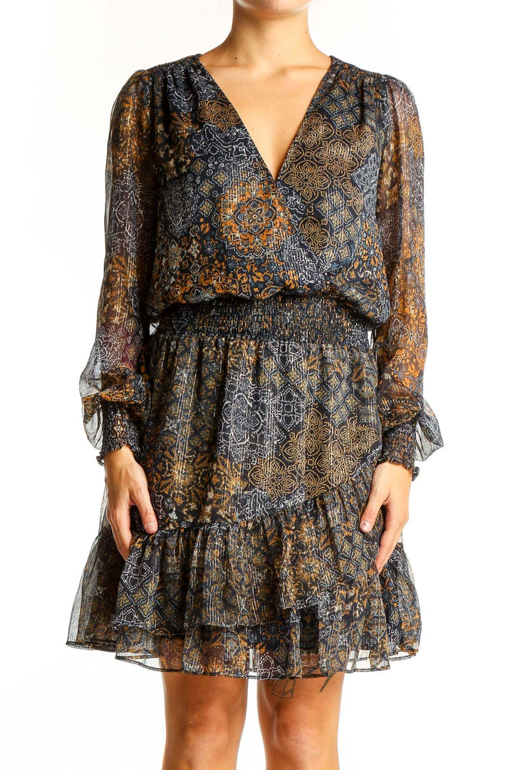 Front view of Michael Kors navy floral chiffon cocktail dress with V-neck and ruffle skirt