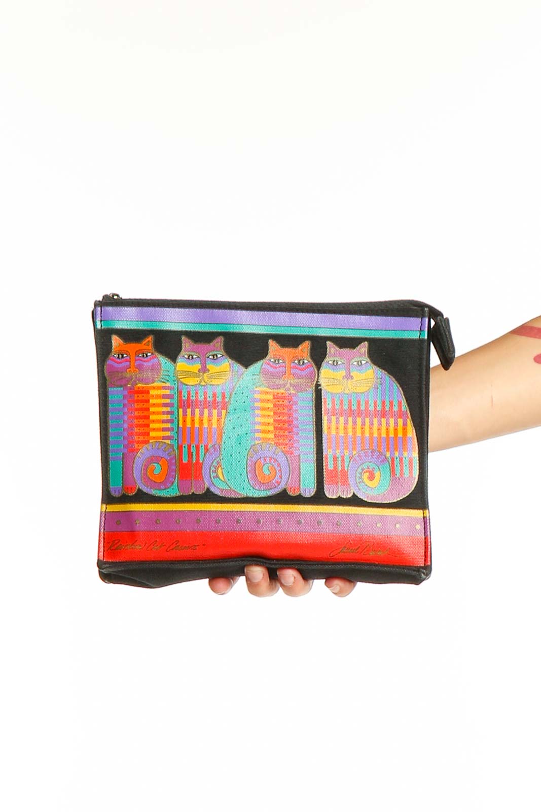 Colorful cat print clutch bag by Laurel Burch with five stylized cats in bright colors