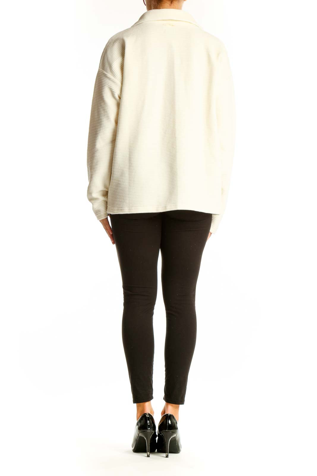 Side view of woman wearing cream ribbed half-zip pullover jacket from L.L.Bean