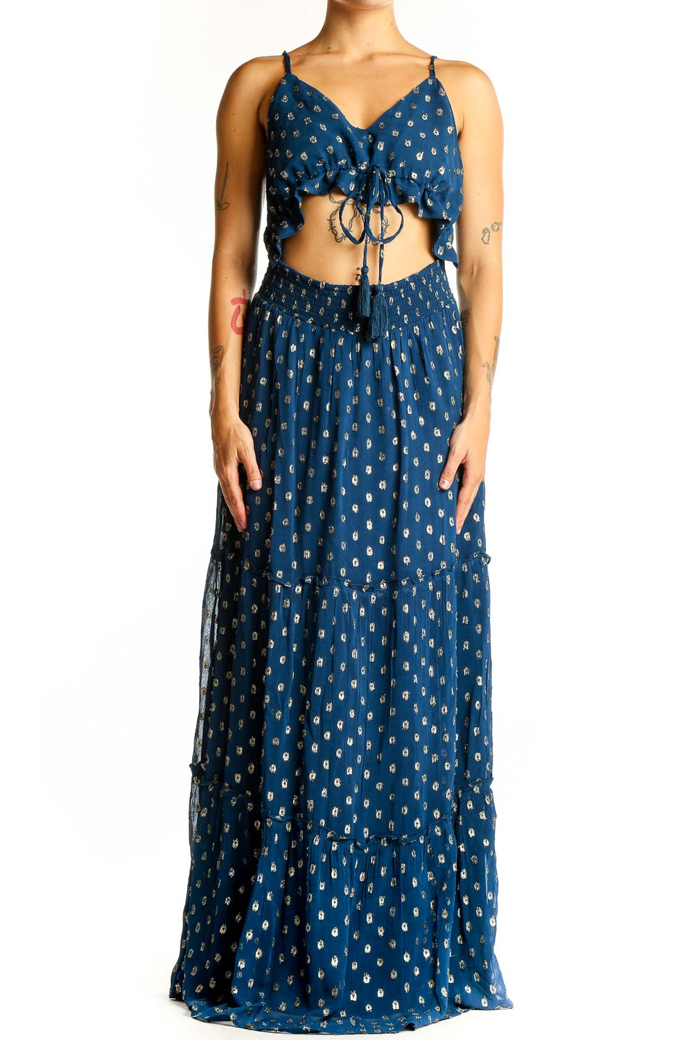 Front view of En Creme blue metallic polka dot maxi dress with cut-out design