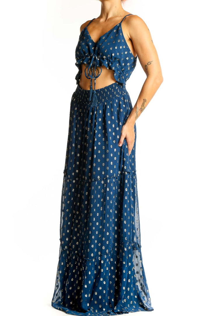 Front view of En Creme blue metallic polka dot maxi dress with cut-out design