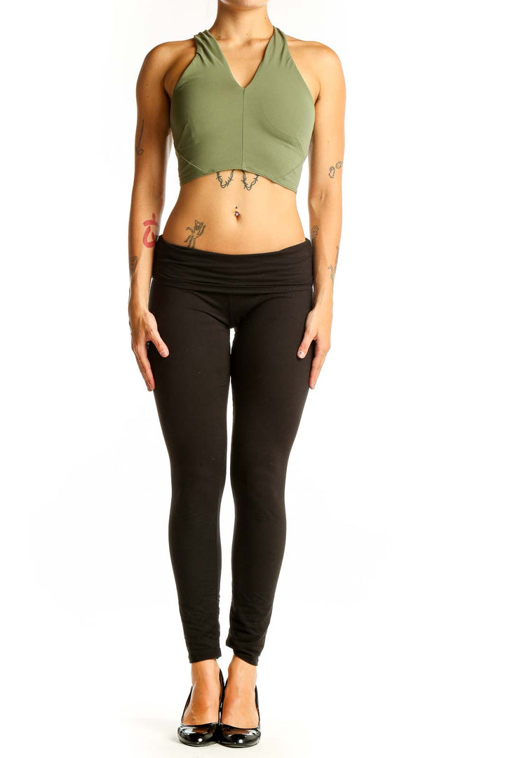 Front view of olive green Lululemon cropped halter top