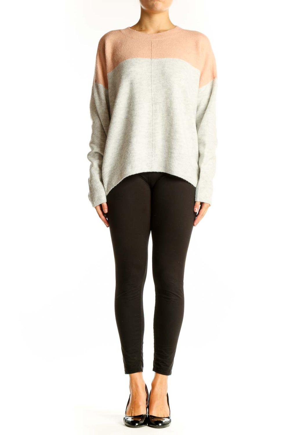 Front view of Vince Camuto peach and gray color block knit sweater