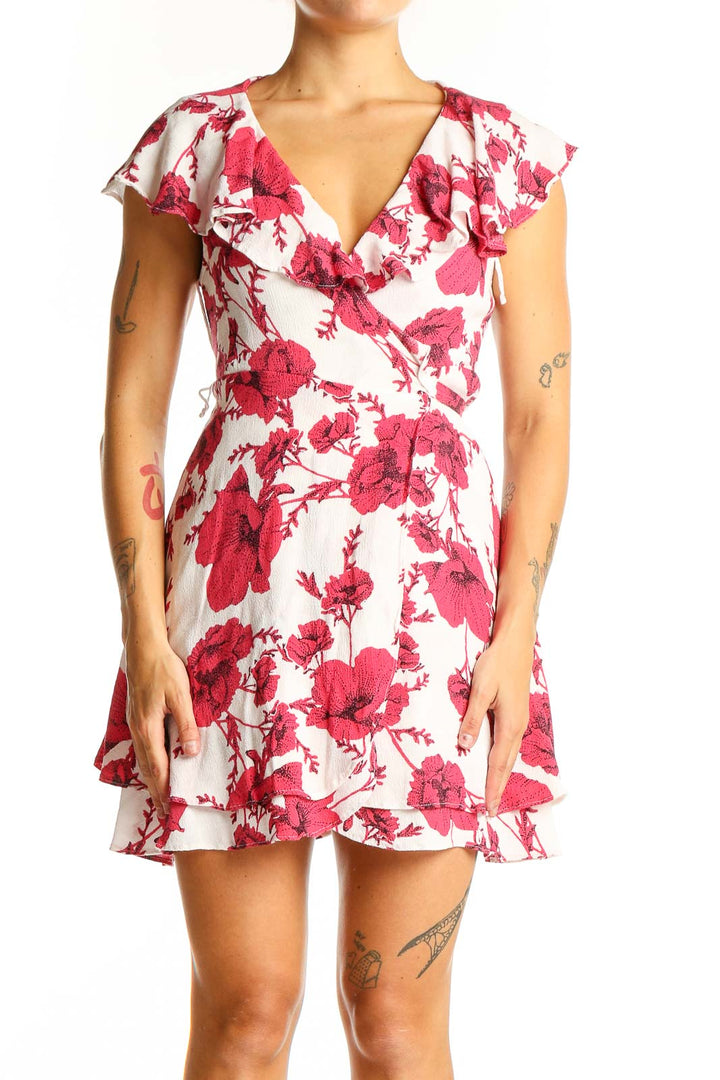 Front view of red floral wrap mini dress with V-neck and cap sleeves