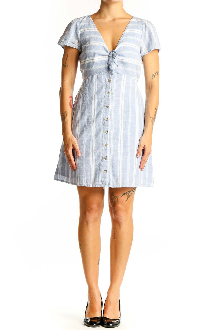 Front view of Abercrombie & Fitch light blue striped cotton dress with tie-front detail