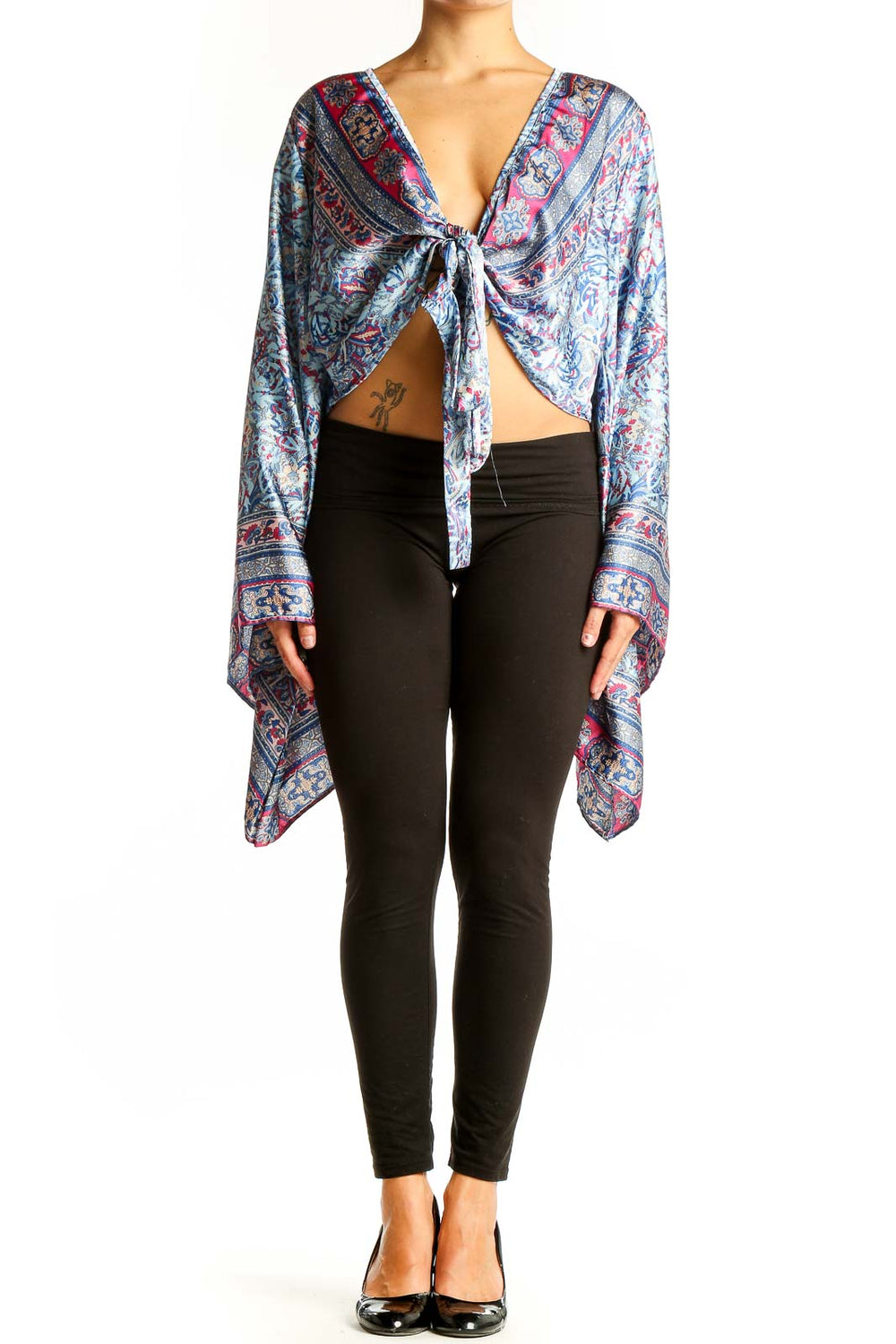 Front view of Galita Blue Floral Paisley Tie-Front Crop Top with long bell sleeves