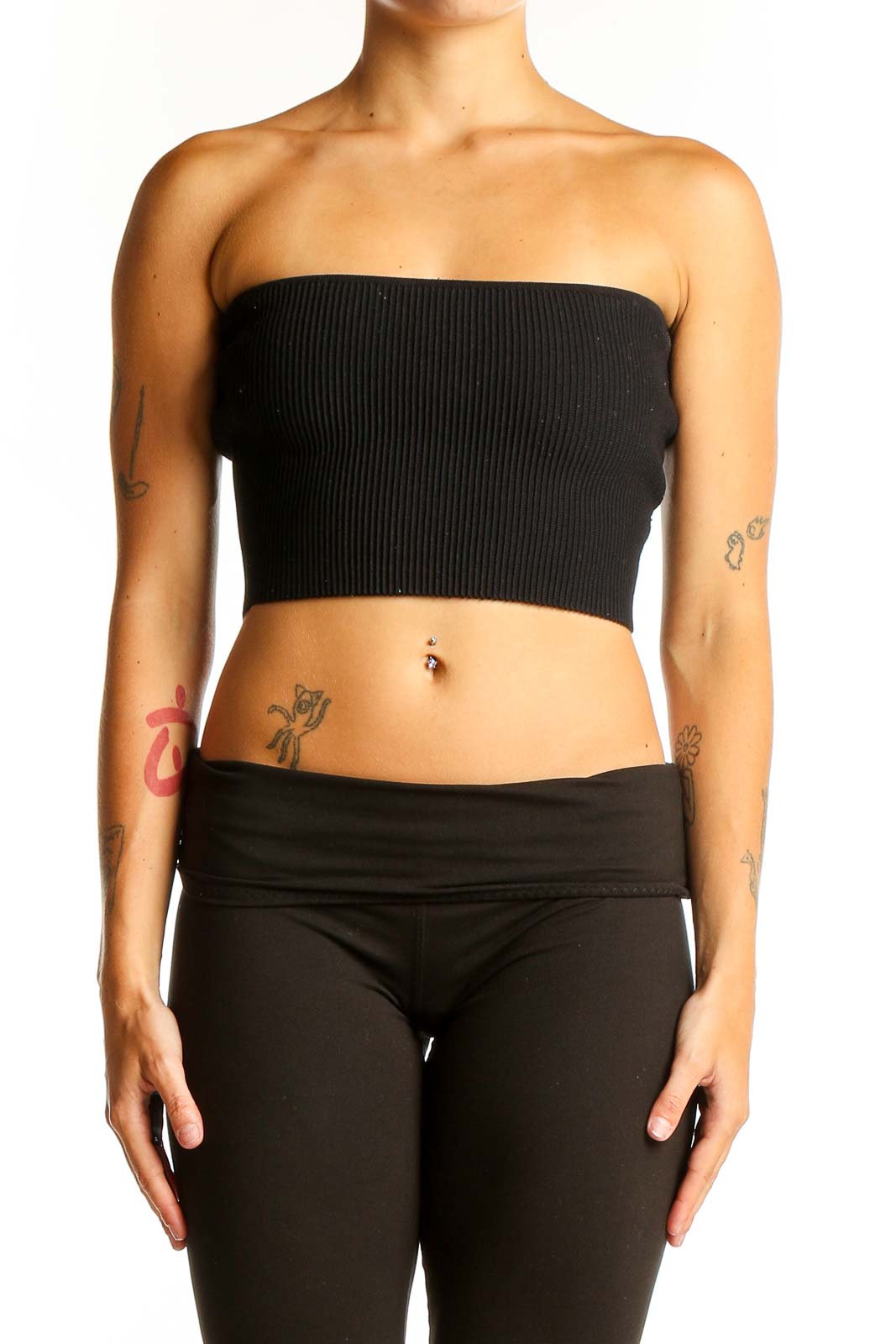 Front view of black ribbed strapless crop top on model