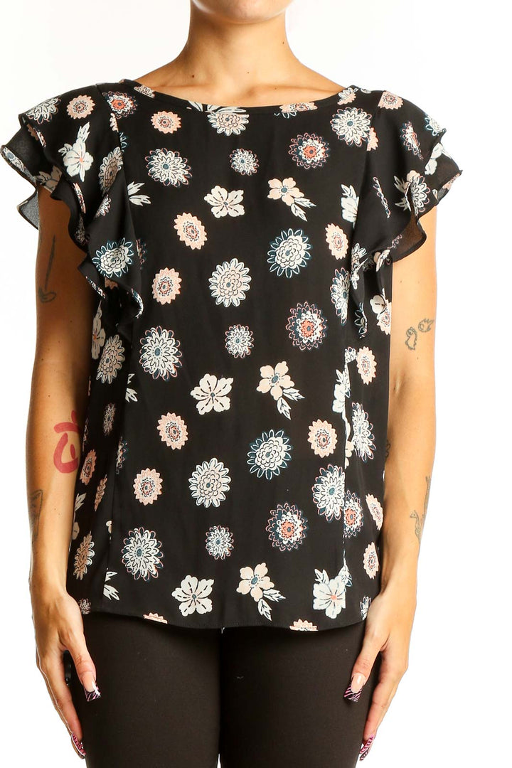 Front view of LOFT Outlet black floral print top with ruffle sleeves