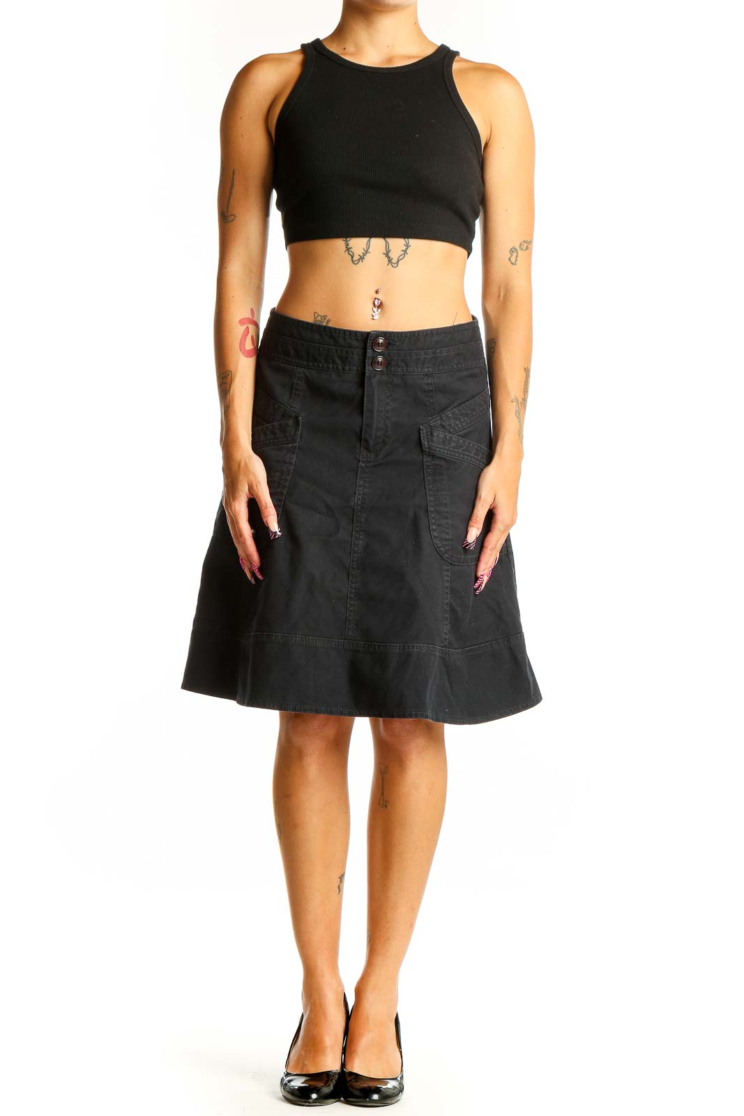 Front view of Nanette Lepore black denim A-line skirt with front pockets
