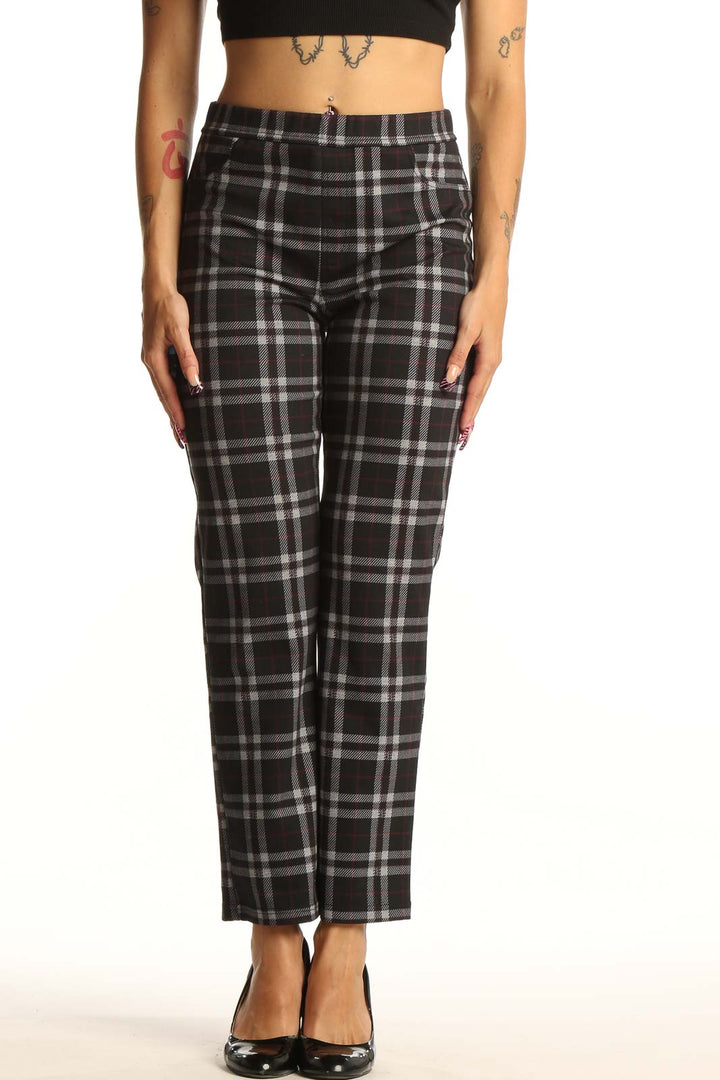 Front view of Sanctuary black plaid straight-leg trousers on model