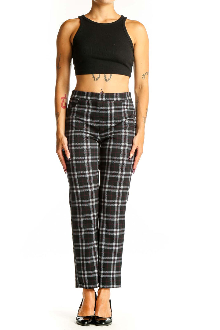 Front view of Sanctuary black plaid straight-leg trousers on model
