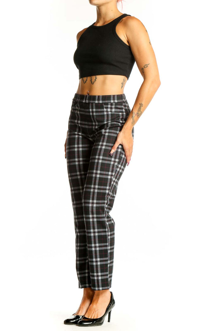 Front view of Sanctuary black plaid straight-leg trousers on model