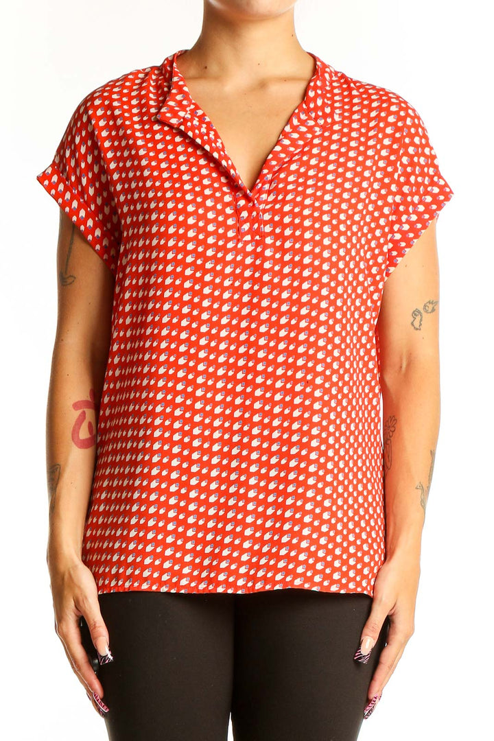 Front view of Pleione red polka dot short sleeve blouse with collar