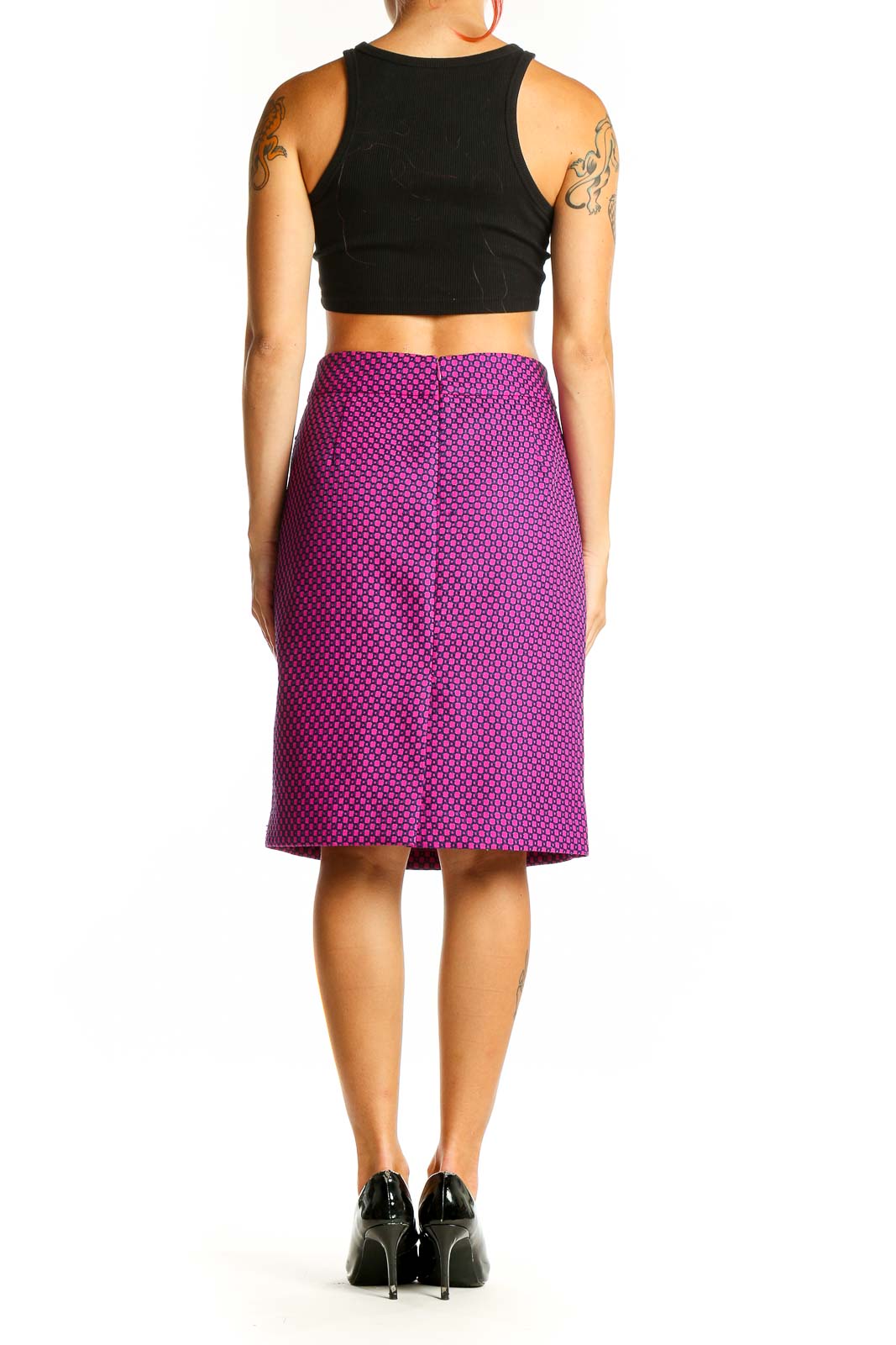 Side view of model wearing Banana Republic purple geometric print pencil skirt with black top