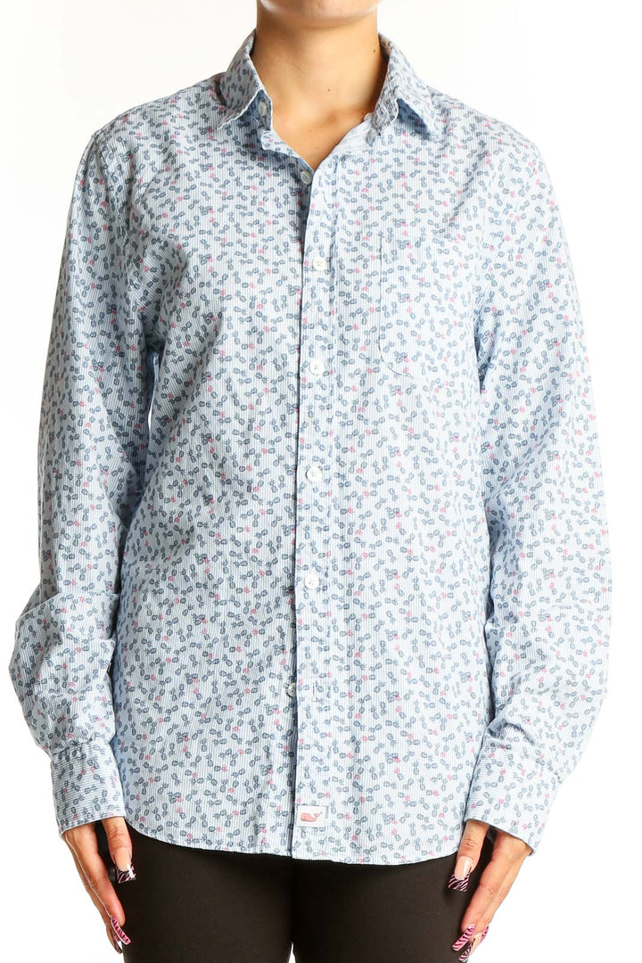 Front view of vineyard vines light blue floral print cotton shirt
