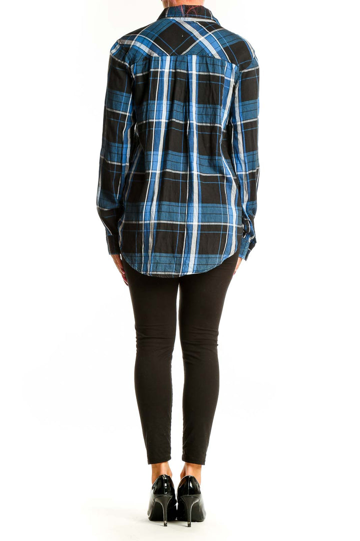 Back view of C&C California blue and black plaid button-up shirt on model