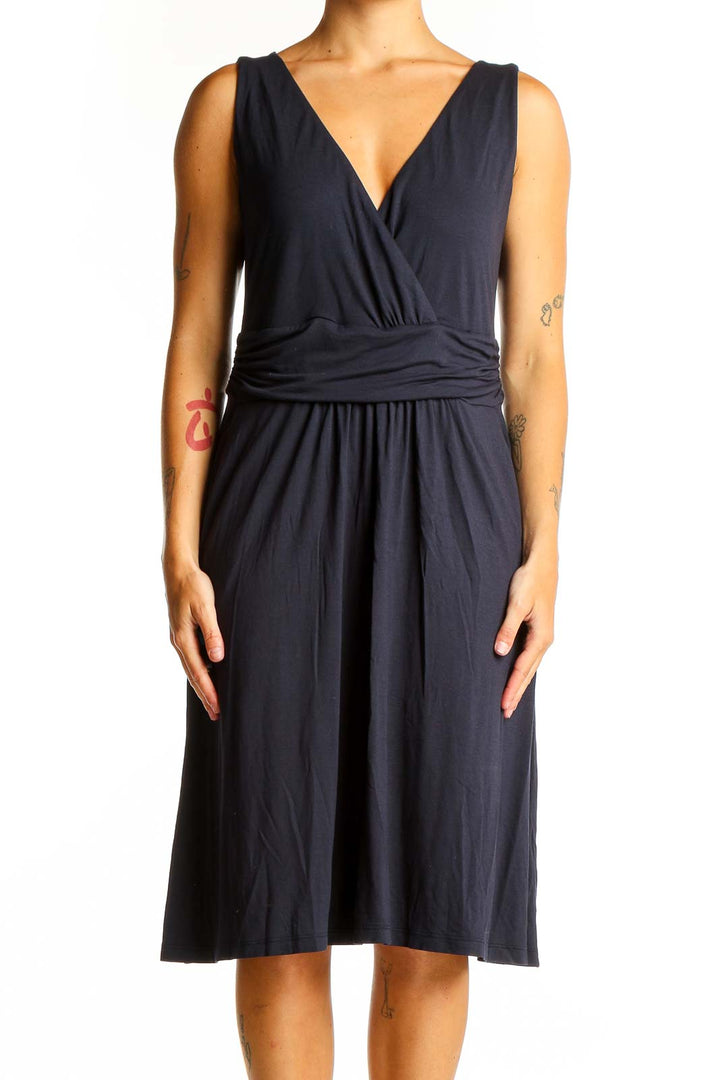 Front view of navy Boden wrap-style sleeveless midi dress