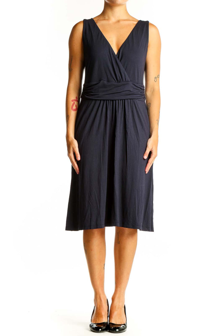 Front view of navy Boden wrap-style sleeveless midi dress