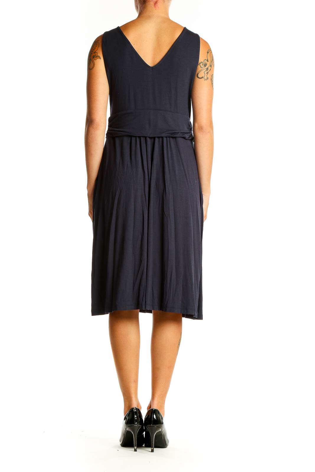 Side view of navy Boden wrap-style sleeveless midi dress with pockets