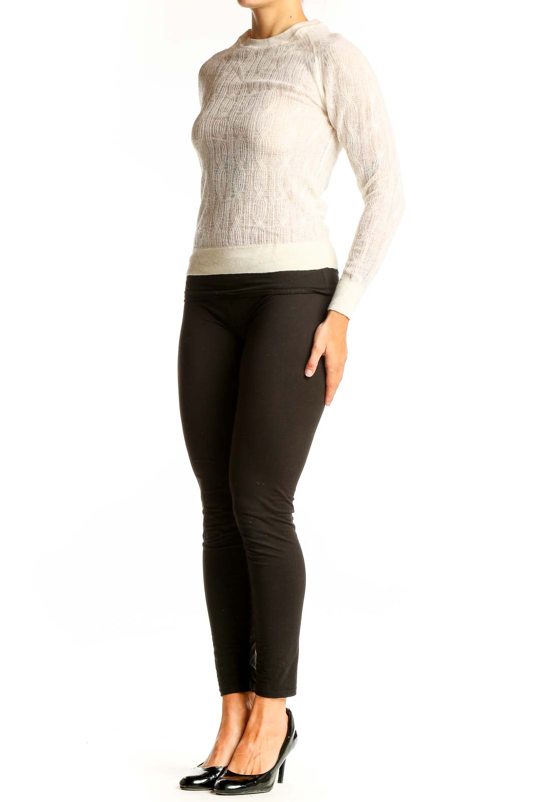 Front view of cream Merino wool cable knit sweater from Banana Republic