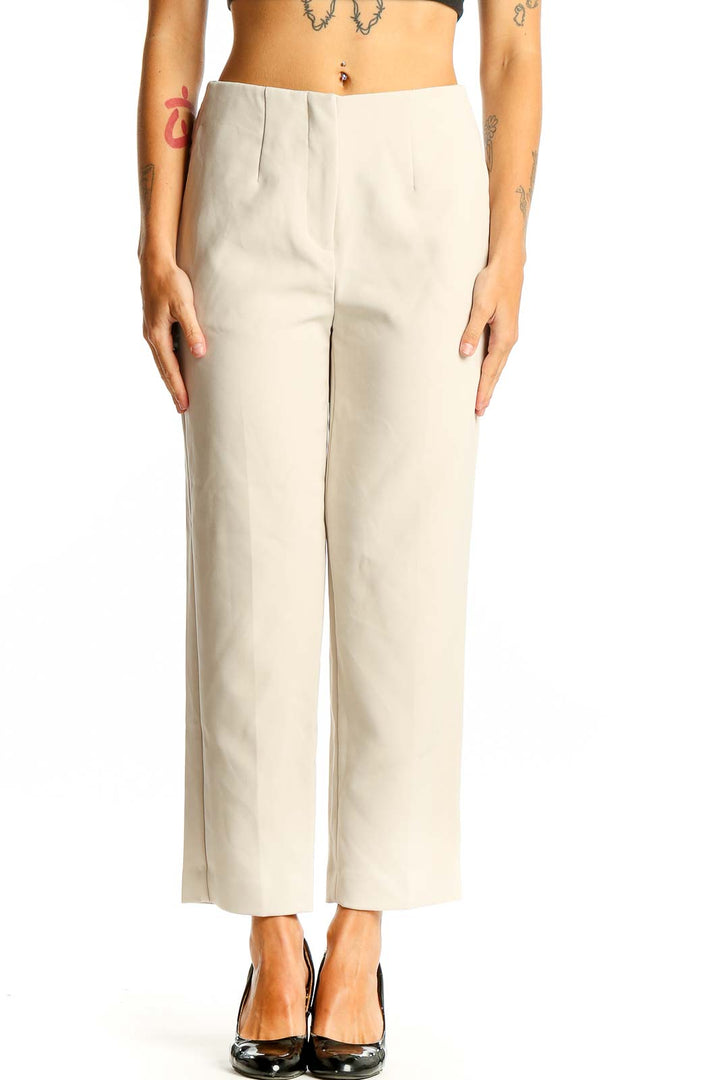 Front view of Ann Taylor beige tailored ankle-length trousers