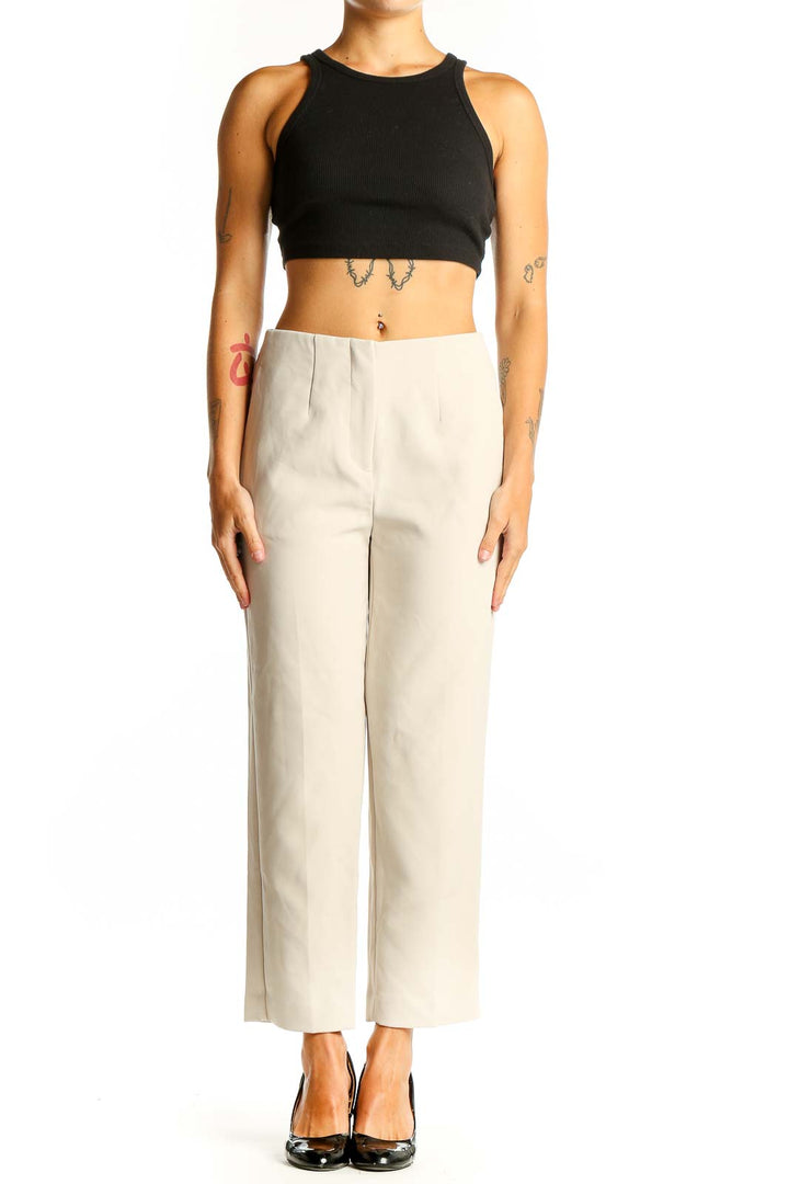 Front view of Ann Taylor beige tailored ankle-length trousers
