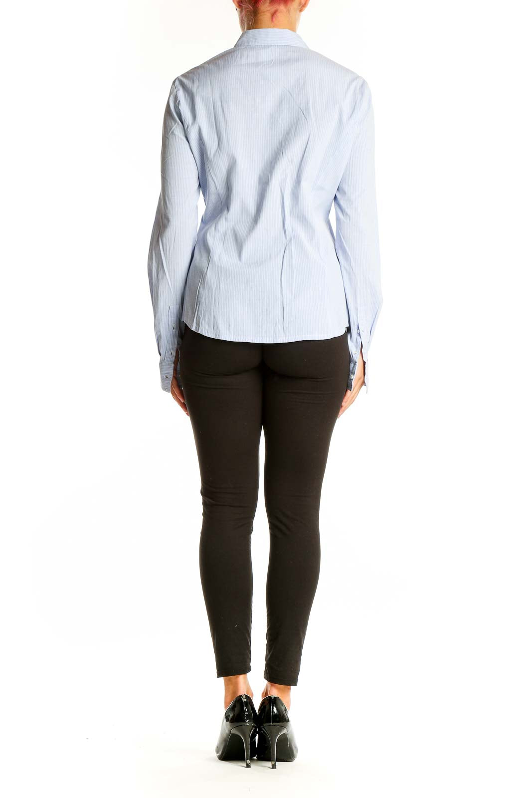 Back view of RESERVED light blue striped button-up shirt on model