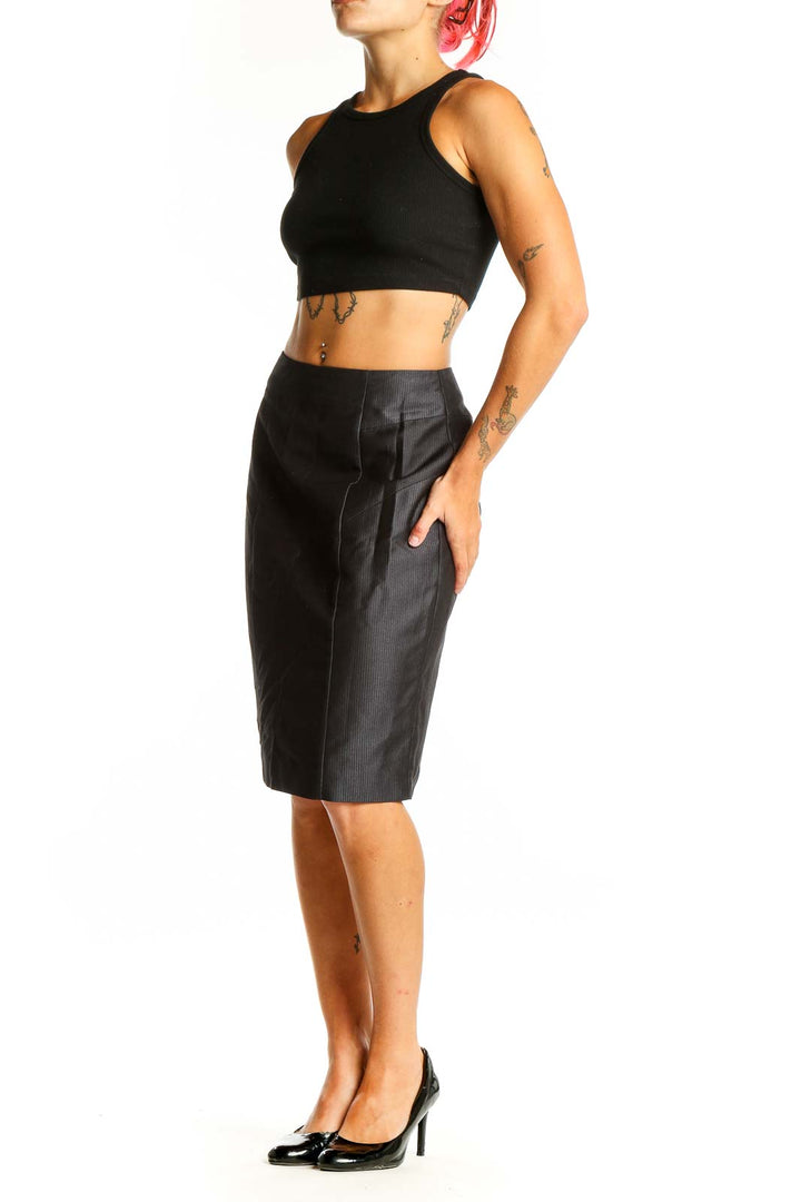 Front view of Koton black pinstriped pencil skirt