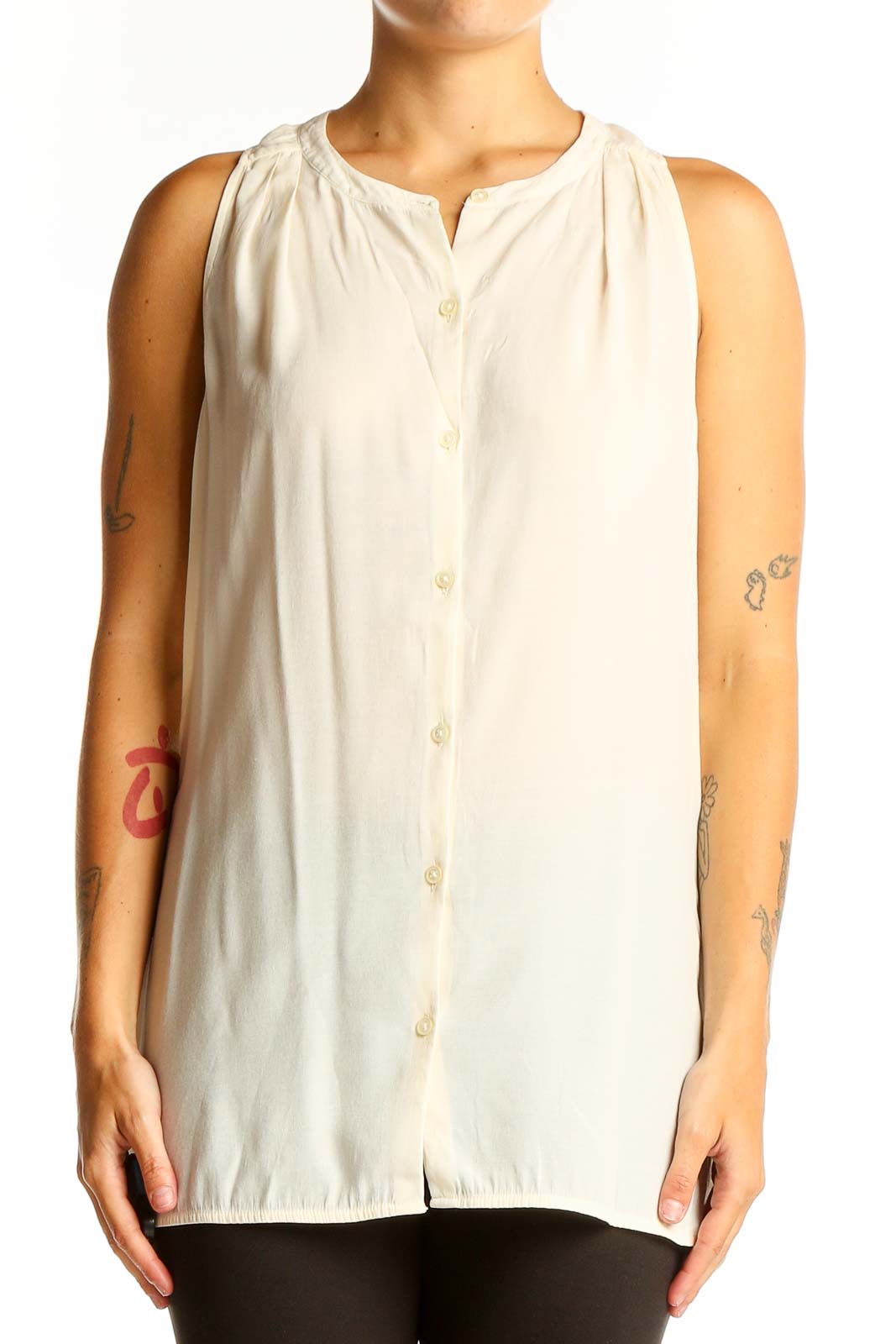 Front view of cream sleeveless button-down blouse from Banana Republic
