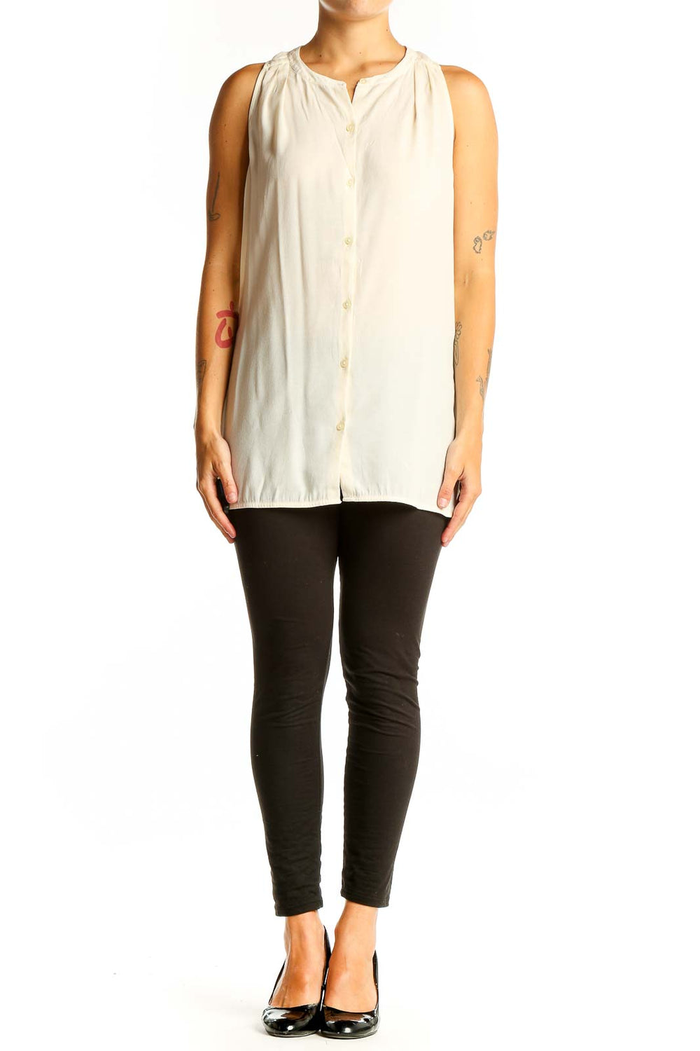 Front view of cream sleeveless button-down blouse from Banana Republic
