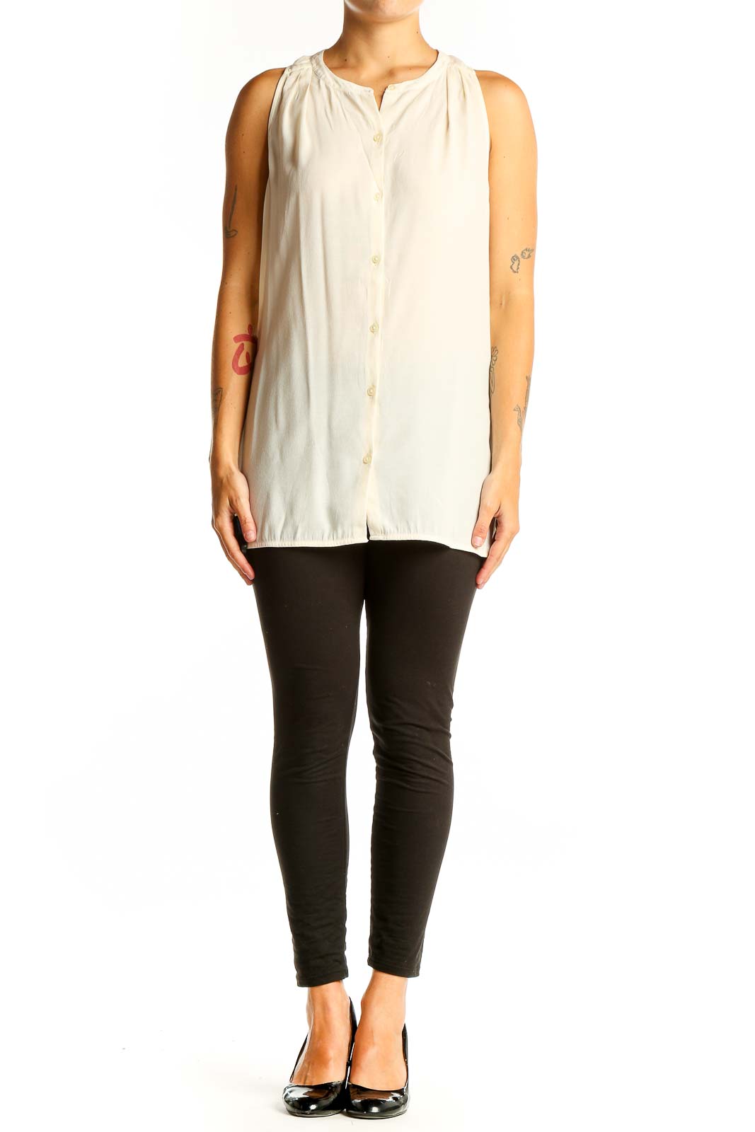 Front view of cream sleeveless button-down blouse from Banana Republic