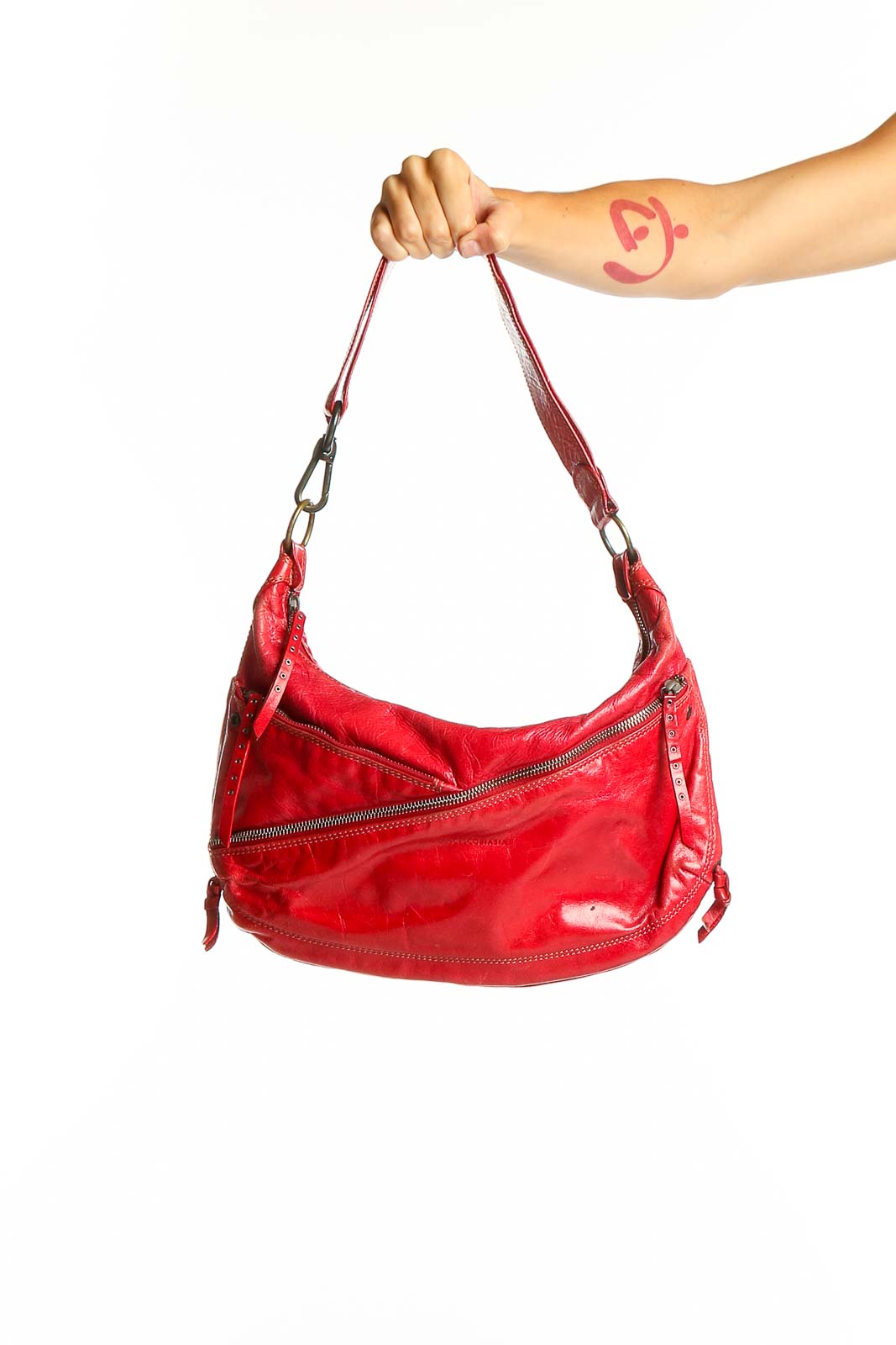 Front view of red leather Francesco Biasia hobo clutch with zipper details