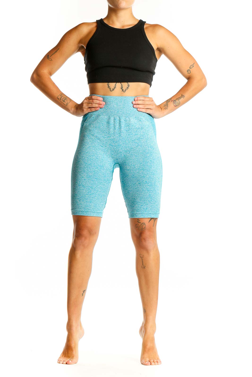 Front view of teal Gymshark high-waisted compression biker shorts