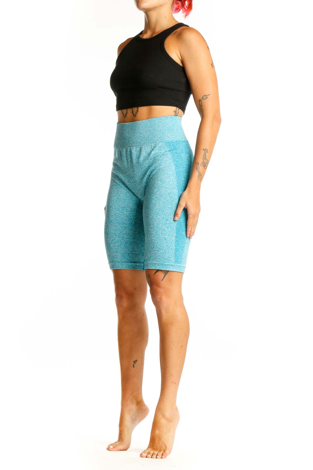 Front view of teal Gymshark high-waisted compression biker shorts