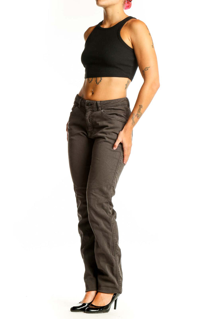 Front view of DU/ER brown straight leg jeans on woman