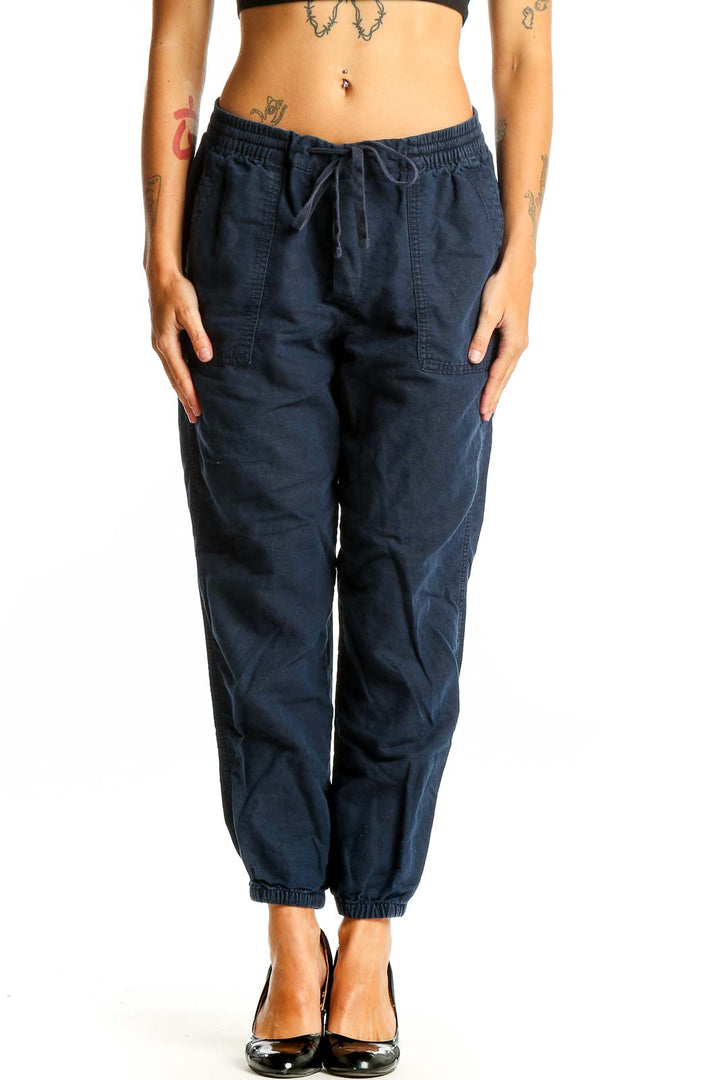 Front view of navy Gap jogger pants with elastic waistband and drawstring