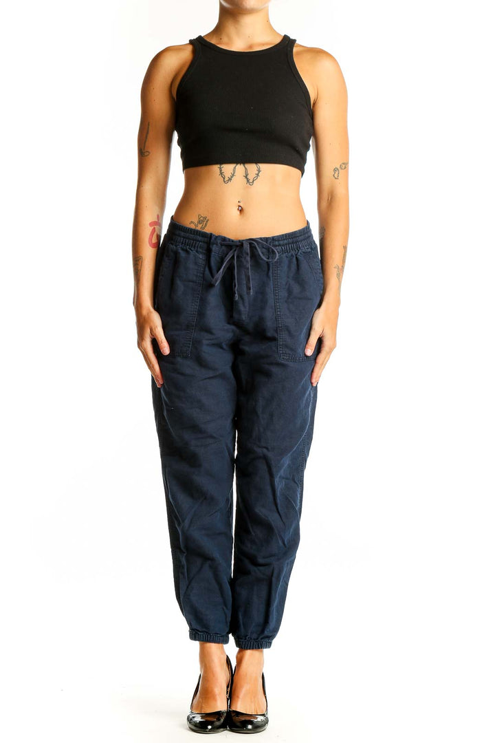 Front view of navy Gap jogger pants with elastic waistband and drawstring