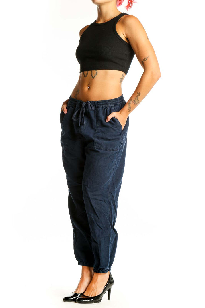 Front view of navy Gap jogger pants with elastic waistband and drawstring