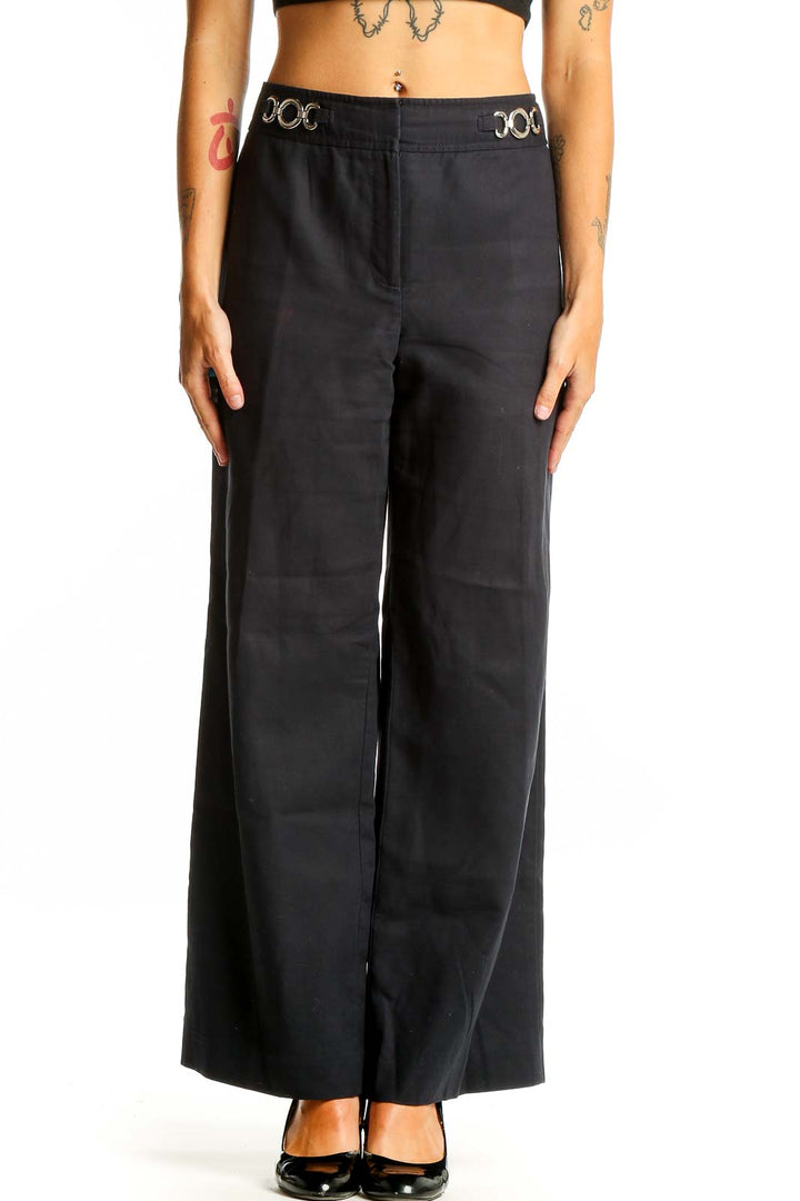 Front view of Ann Taylor black wide-leg acetate pants with metal ring waist details