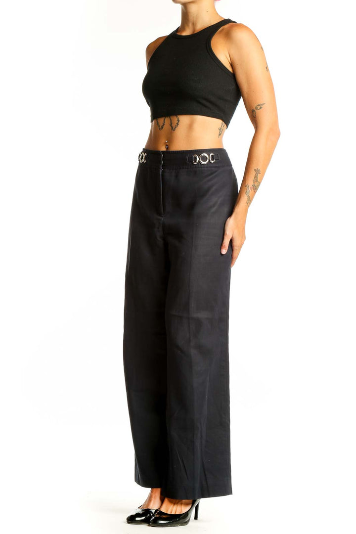 Front view of Ann Taylor black wide-leg acetate pants with metal ring waist details
