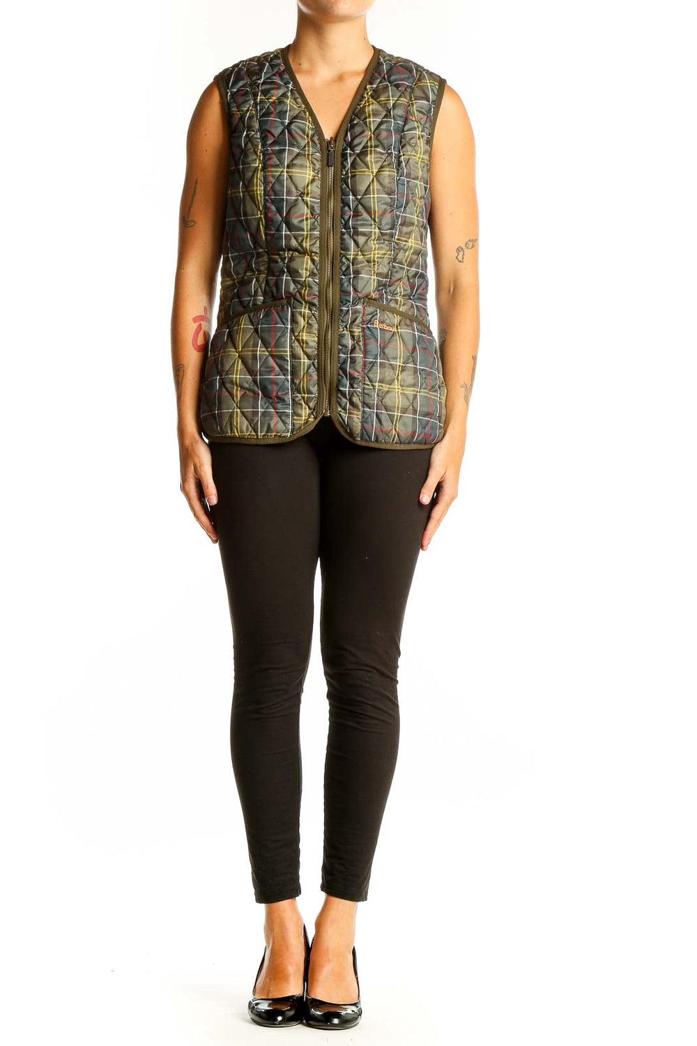 Front view of olive Barbour quilted vest with camo print
