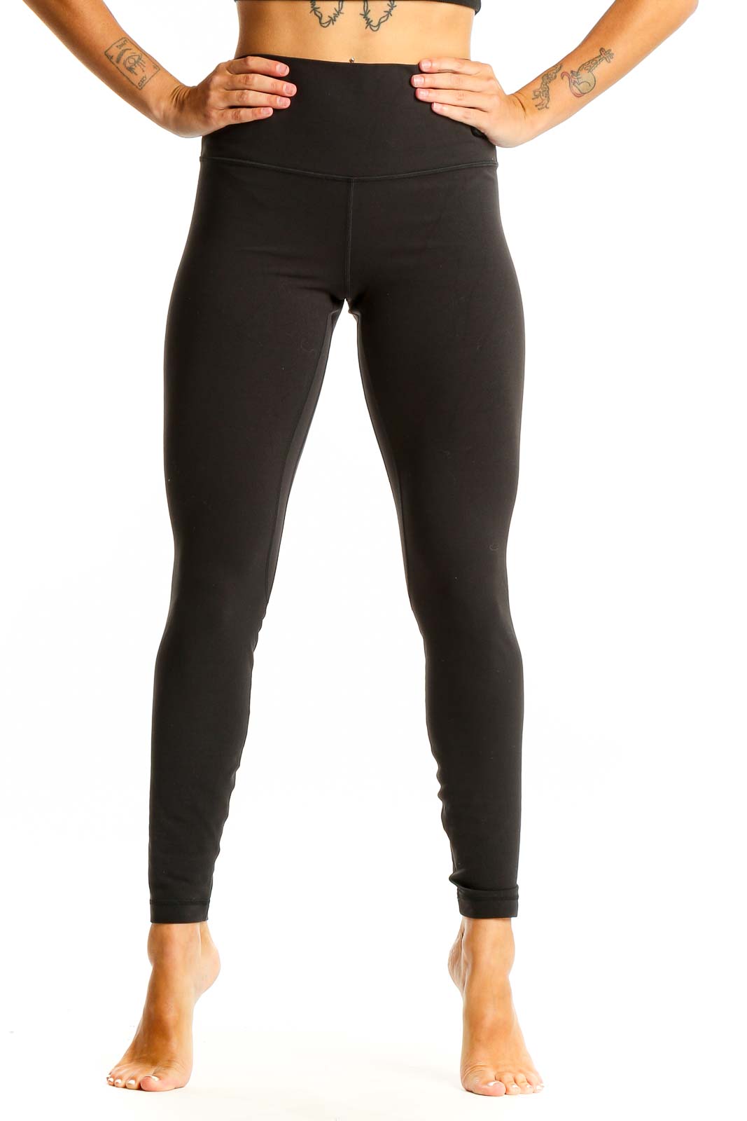 Front view of black Lululemon high-waisted performance leggings