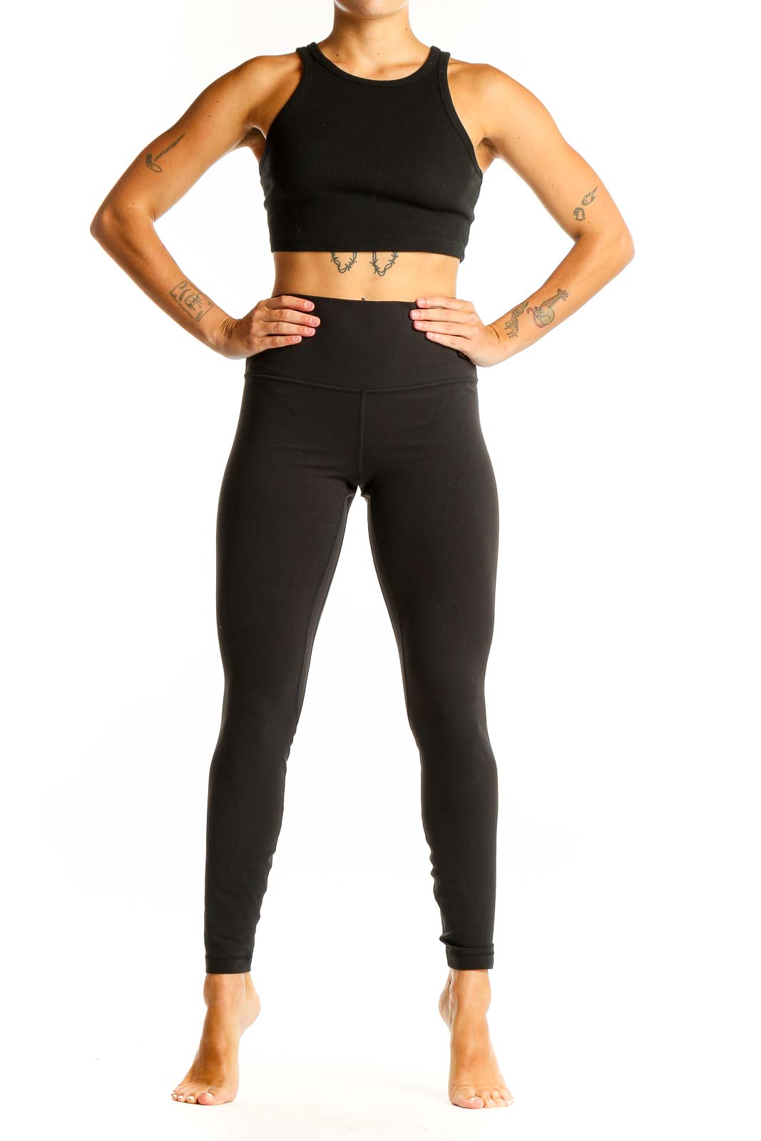 Front view of black Lululemon high-waisted performance leggings