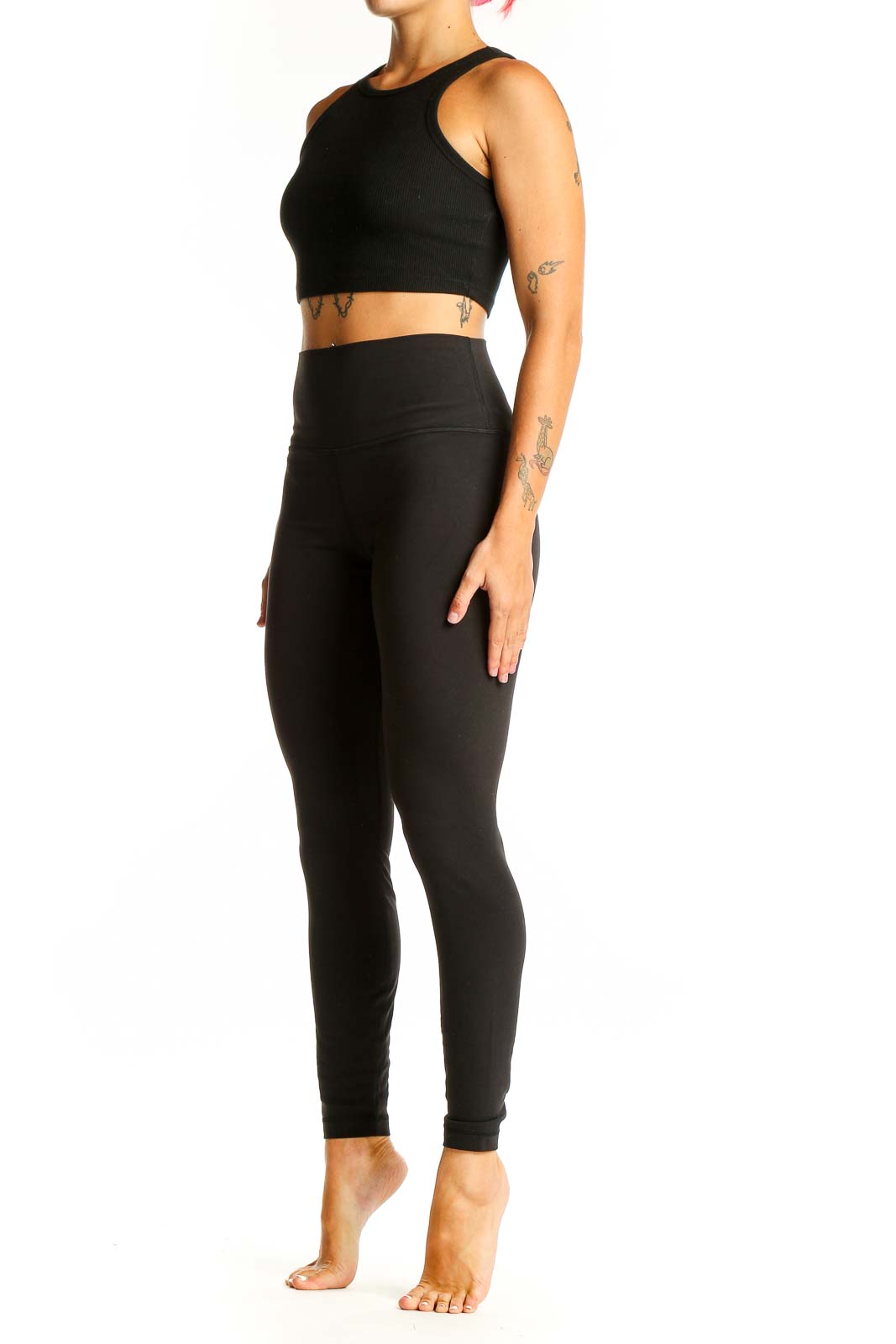 Front view of black Lululemon high-waisted performance leggings