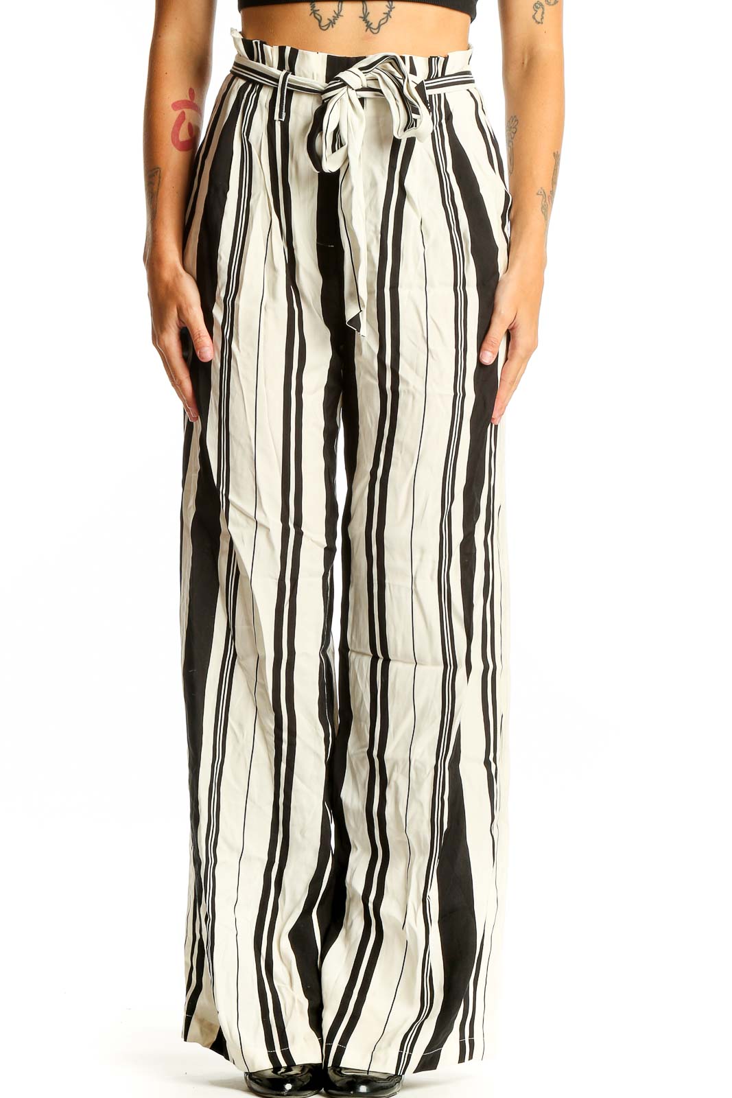 Front view of Chelsea 28 black and white striped wide-leg pants with paper bag waist
