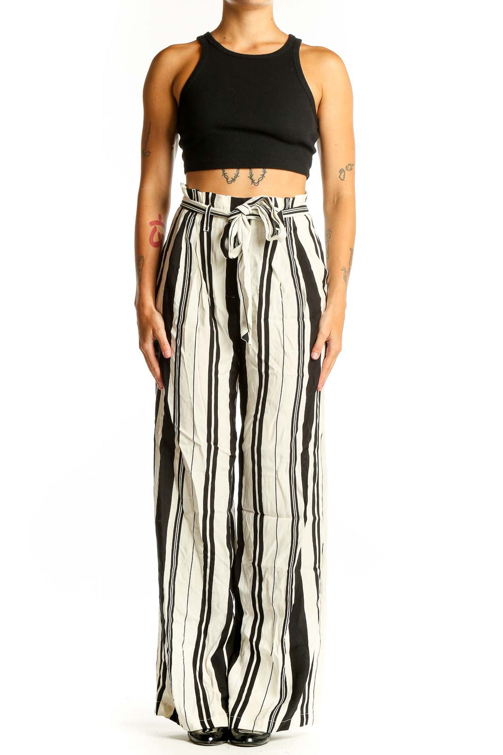 Front view of Chelsea 28 black and white striped wide-leg pants with paper bag waist