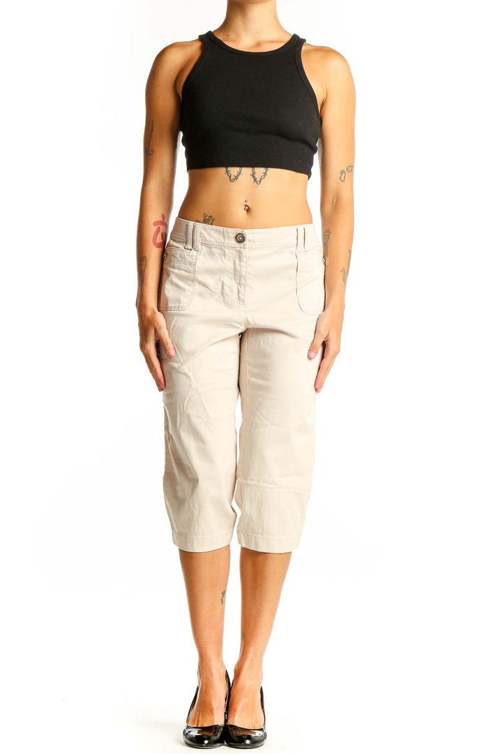 Front view of White House Black Market beige capri pants